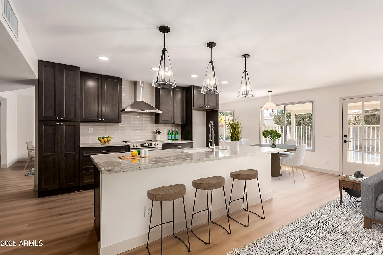Dark espresso kitchen remodel with granite island